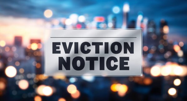 eviction notice lettering on business concept urban city skyline blurred lights bokeh background